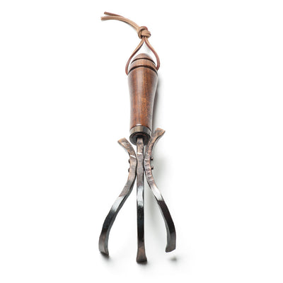 Three tined hand-crafted garden rake